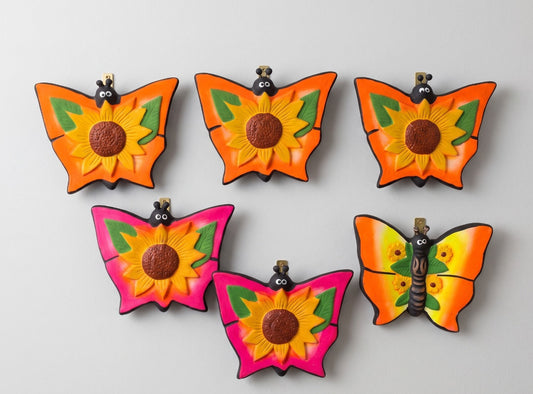 Mariposa decorativa de pared en cerámica naranja con girasol - vimarq.com | El Salvador2