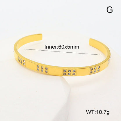 Brazalete Tipo Esclava "Geo-Luxe" en Acero Inoxidable Pulido con Estaciones de Cristal