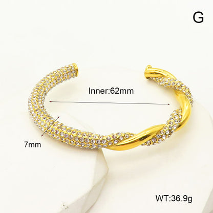 Brazalete "Argentum" Torcido en Acero Inoxidable Macizo y Cristales Pavé