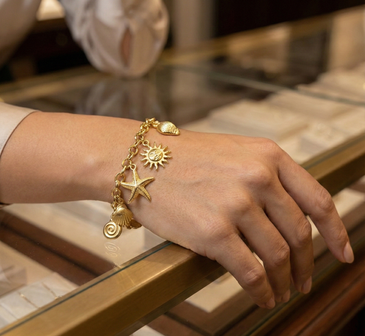 Pulsera "Ocean Luxe" – Dijes Marinos en Acero Inoxidable Dorado vimarq.com El Salvador