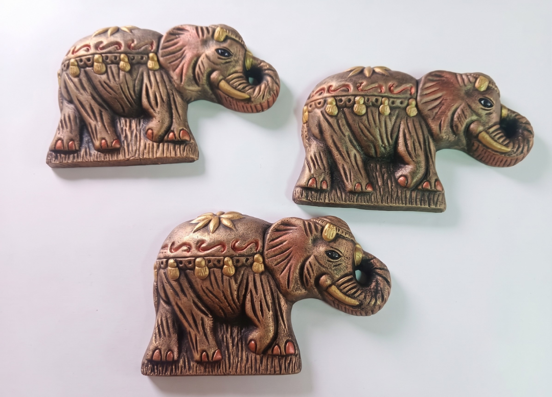 elefantes-barro-decorativos-pared-suerte-vimarq.com-El-Salvador
